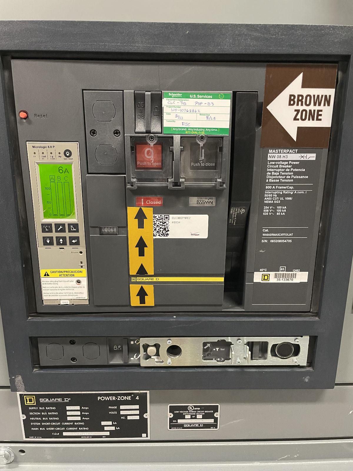 Square D Masterpact NW drawout breaker racked into its cell, trip unit and accessories visible